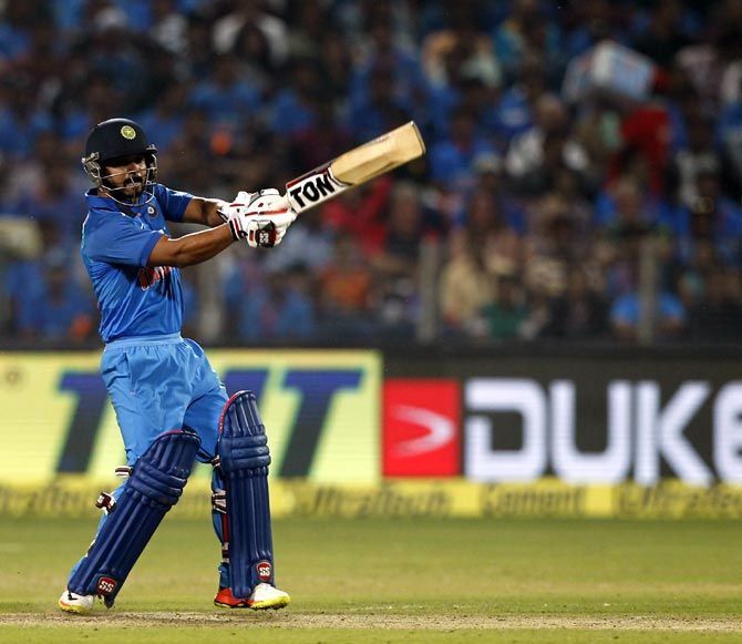 Kedar Jadhav hits out during the first ODI in Pune