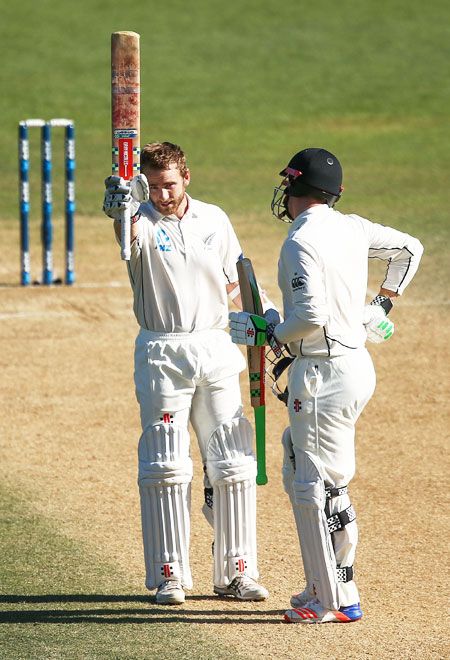 New Zealand's Kane Williamson celebrates his century with teammate Henry Nicholls on Day 5 of the First Test against Bangladesh at Basin Reserve in Wellington on Monday