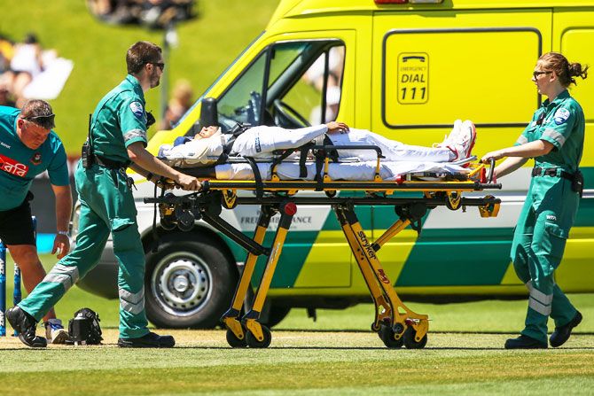 Bangladesh's Mushfiqur Rahim  is stretchered into an ambulance after being struck in the helmet by a delivery from New Zealand's Tim Southee  on Day 5 of the first Test at Basin Reserve in Wellington on Monday