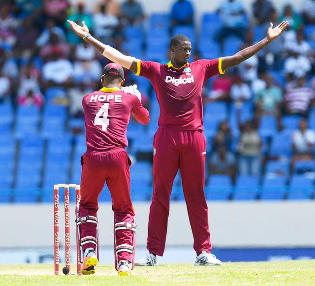 West Indies captain Jason Holder celebrates the wicket of Hardik Pandya during the 4th ODI at North Sound in Antigua on Sunday