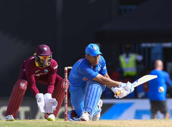 Mahendra Singh Dhoni bats during his painful innings of 54 off 114 deliveries during the fourth ODI vs West Indies on Sunday
