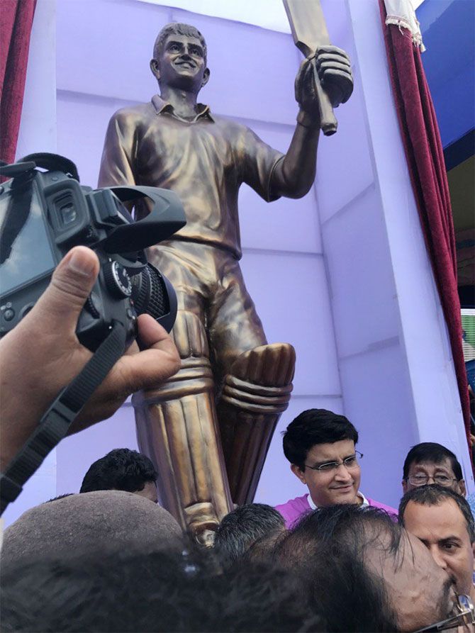 Sourav Ganguly (in purple) is surrounded by fans during the unveiling of his bronze statue in Balurghat in West Bengal on Saturday