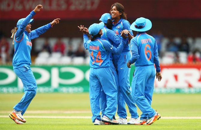 India cricketers celebrate on defeating New Zealand in their ICC Women's World Cup match in Derby on Saturday