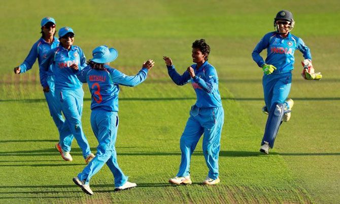 India's Deepti Sharma celebrates a wicket with teammates