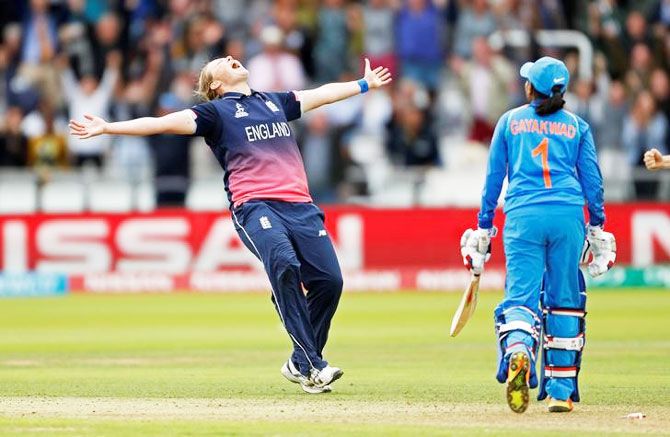 England's Anya Shrubsole celebrates bowling out India's Rajeshwari Gayakwad to win the World Cup on Sunday
