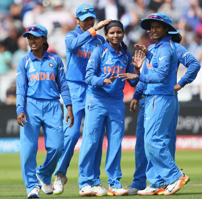 Rajeshwari Gayakwad is congratulated by team-mates after taking the wicket of England opener Lauren Winfield during the ICC Women's World Cup 2017 final at Lord's Cricket Ground in London on July 23