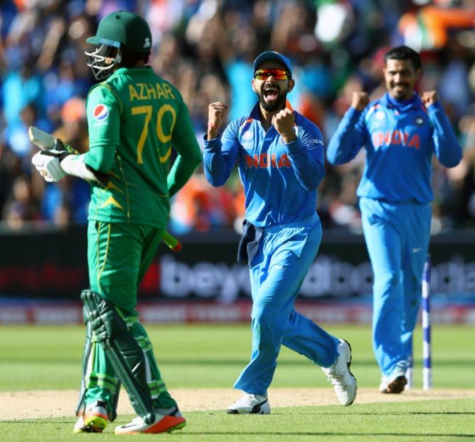 India Captain Virat Kohli and Ravindra Jadeja celebrate Azhar Ali's wicket in the opening game of last year's Champions Trophy. Photograph: Gareth Copley/Getty Images