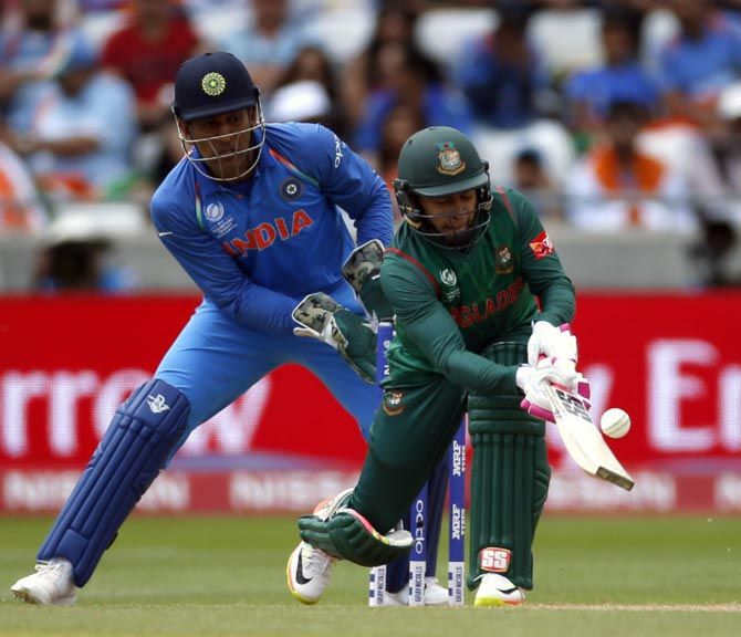 Bangladesh's Mushfiqur Rahim in action plays the scoop shot 