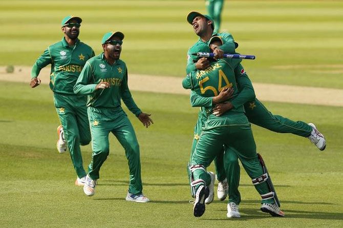 Pakistan's Sarfraz Ahmed and teammates celebrate winning the ICC Champions Trophy against India in London on Sunday