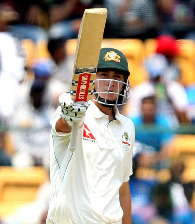  Matt Renshaw celebrates his fifty on Sunday. The Australian opener showed solid defensive technique and hit five fours and a six off Jadeja in his 196-ball stay at the crease