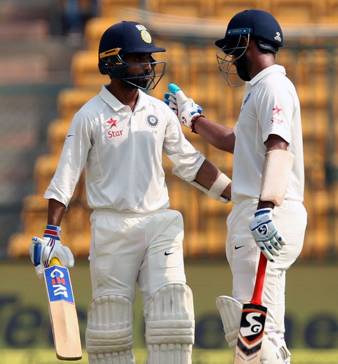 Cheteshwar Pujara (right) and Ajinkya Rahane batted well to stitch up a partnership of 118 runs