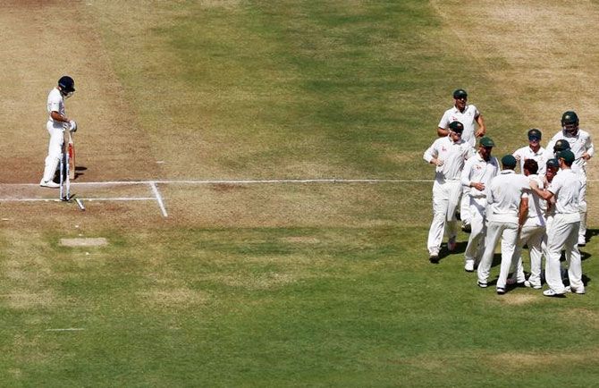 Australia players celebrate the wicket of India captain Virat Kohli in the first Test in Pune, Australia dominated India in that first Test and will look to bounce back in Randhi after losing the 2nd Test in Bangalore last week