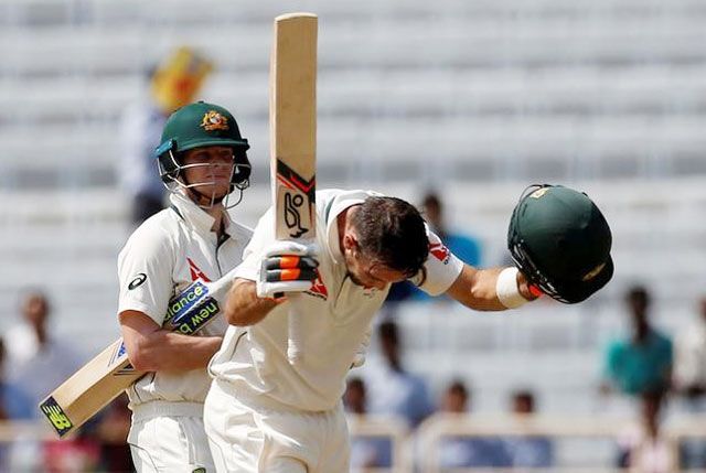 Australia's Glenn Maxwell celebrates his century against India on Friday