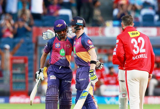 Rising Pune Supergiant's Ajinkya Rahane and Steven Smith celebrate after the win