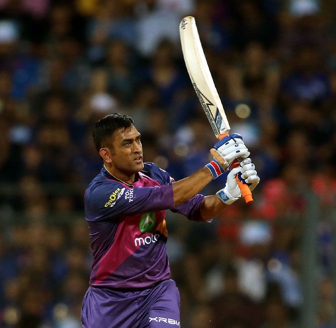 Mahendra Singh Dhoni watches the ball as it goes into the stands for a six during Qualifier 1 of the Indian Premier League against Mumbai Indians at the Wankhede in Mumbai on Tuesday