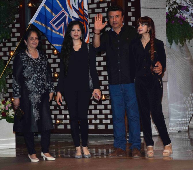 Bollywood music composer Anu Malik and his family arrive for the party
