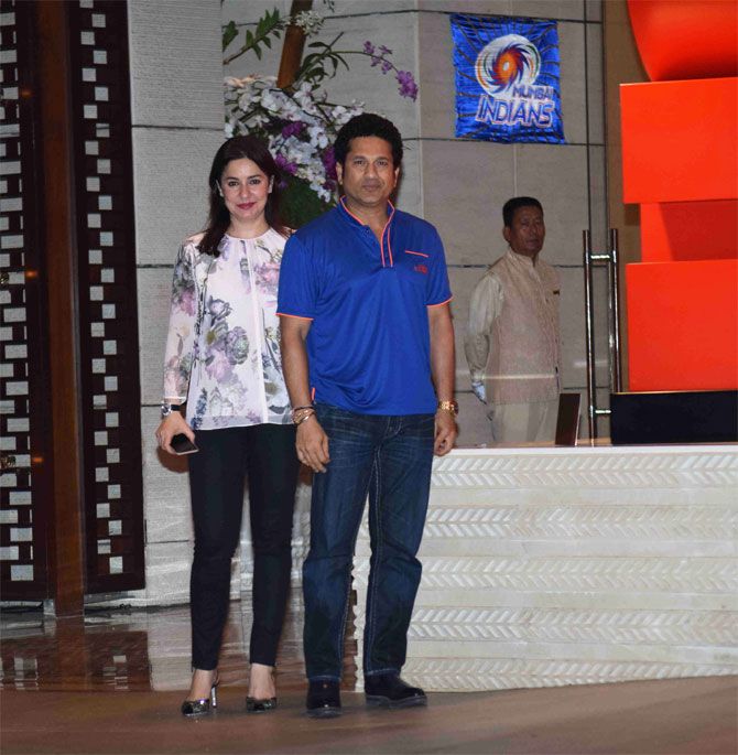 Mumbai Indians' team mentor Sachin Tendulkar and wife Anjali arrive for the party thrown by the team owners Mukesh and Nita Ambani, at a city hotel in Mumbai on Monday