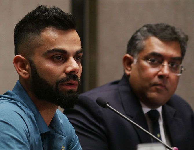 India captain Virat Kohli with team manager Kapil Malhotra at the pre-departure press conference in Mumbai on Wednesday