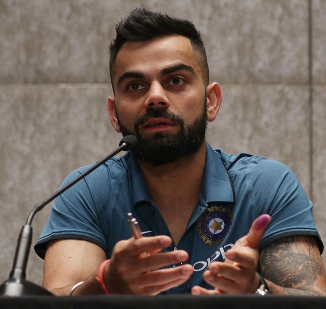 India captain Virat Kohli speaks at a press conference on the eve of the team's departure to England for the Champions Trophy