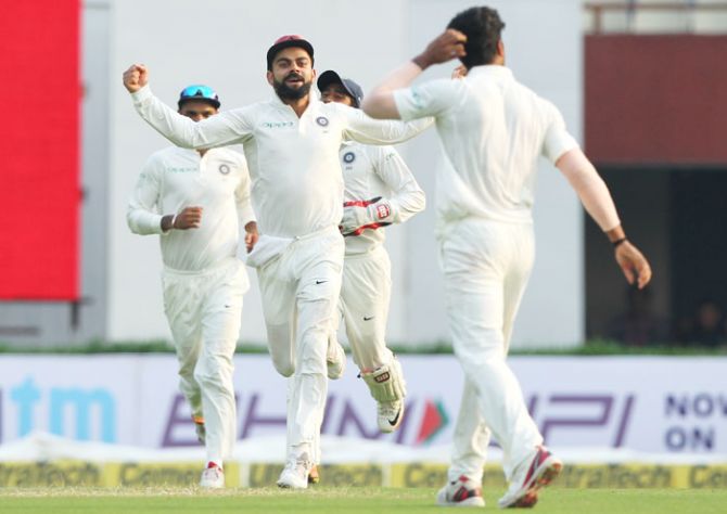 India captain Virat Kohli celebrates the wicket of Sri Lanka's Angelo Mathews on Day 3 of the 1st Test at Eden Gardens in Kolkata on Saturday