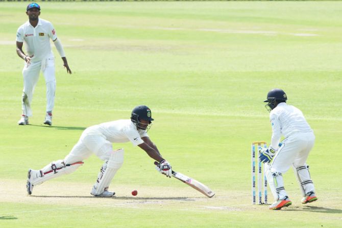 India's Wriddhiman Saha gets a reprieve as Sri Lanka wicket-keeper Niroshan Dickwella fails to stump the batsman