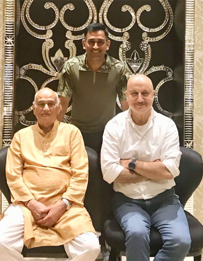 India 'keeper MS Dhoni with his father and actor Anupam Kher at his home in Ranchi 