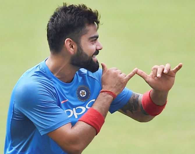 Virat Kohli in a playful mood during a team practice session at Wankhede Stadium in Mumbai on Saturday