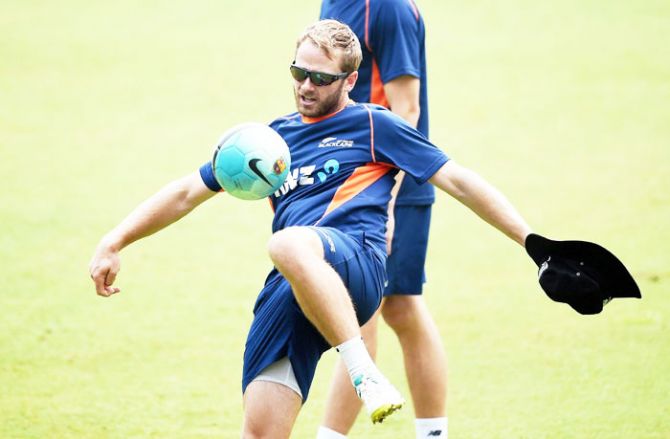 New Zealand captain Kane Williamson plays ball during a practice session