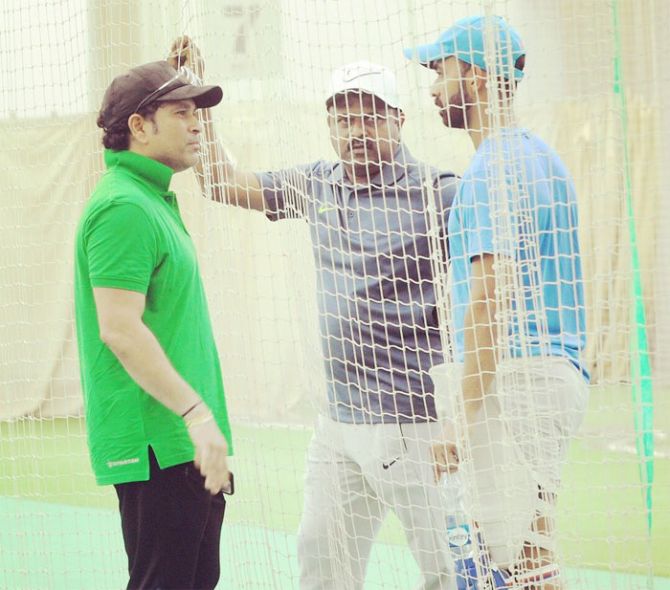Sachin Tendulkar (left) dropped in at the Bandra-Kurla complex indoor nets in Mumbai and shared some words of advice with Ajinkya Rahane earlier this month
