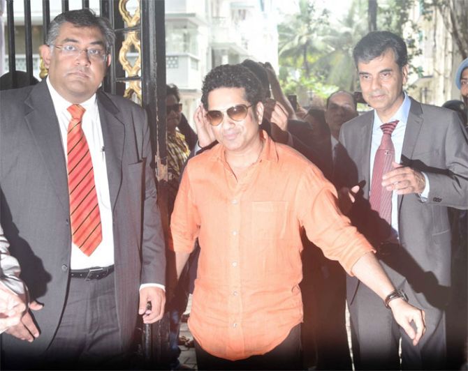 India cricket legend Sachin Tendulkar walks through the gates after inaugurating the 'Raj Singh Dungarpur' gate at the Cricket Club of India in Mumbai on Friday