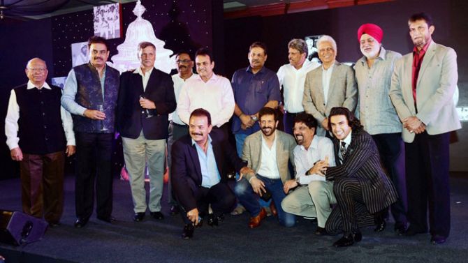 (Standing) 1983 World Cup-winning manager PR Man Singh, along with players Dilip Vengsarkar, Roger Binny, Sunil Valson, Yashpal Sharma, Kirti Azad, Kapil Dev, Mohinder Amarnath, Balwinder Singh Sandhu, Sandip Patil, (sitting) Madan Lal and Krishnamachari Srikkanth with director Kabir Khan (centre) and actor Ranvir Singh (right) during the launch of Khan's film titled '1983', in Mumbai on Wednesday. The film is based on India’s 1983 World Cup win. Ranveer Singh will essay the role of Kapil Dev in the film.