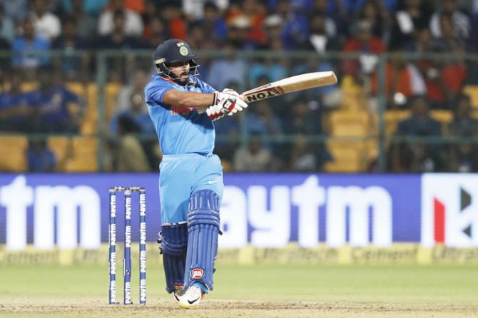 Kedar Jadhav pulls the ball for a boundary during his 67-run innings