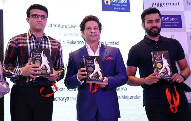 Former India captains Sourav Ganguly and Sachin Tendulkar and India cricketer Rohit Sharma at the launch of Ganguly's autobiography 'A century is not enough' in Mumbai on Wednesday