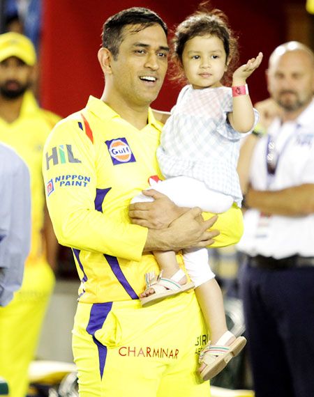 Mahendra Singh Dhoni in a playful mood with his daughter Ziva