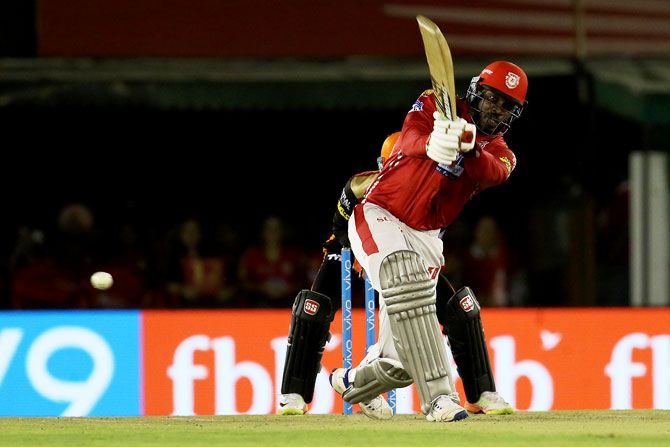 Chris Gayle goes after the bowling