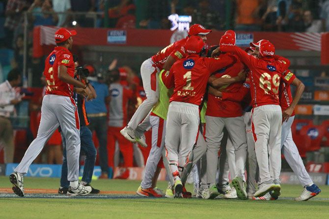 Kings XI Punjab players celebrate after defeating Delhi Daredevils on Monday