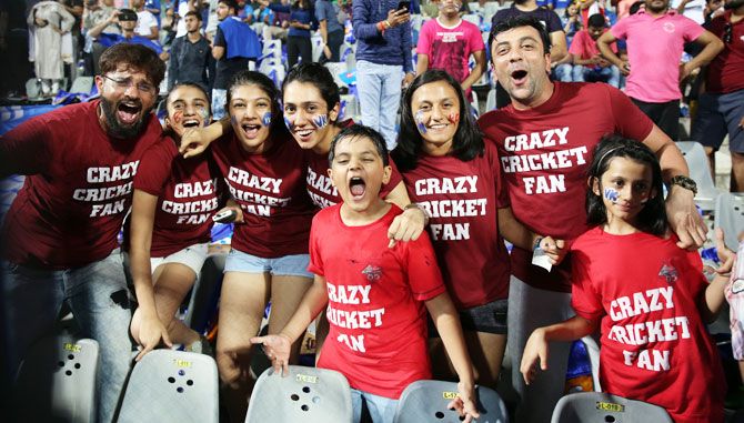 Fans enjoy during match fourteen of the Vivo Indian Premier League 2018 (IPL 2018) between the Mumbai Indians and the Royal Challengers Bangalore 