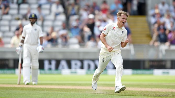 Sam Curran celebrates after claiming the wicket of Lokesh Rahul in the first innings