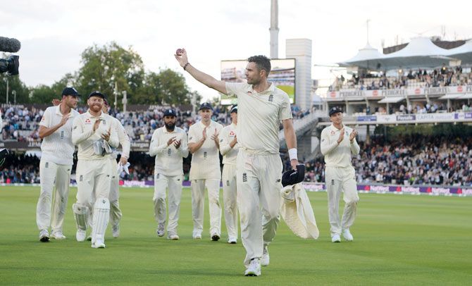England's James Anderson acknowledges the crowd after taking a five wicket haul on Day 2 of the 2nd Test at Lord's Cricket Ground in London on Friday