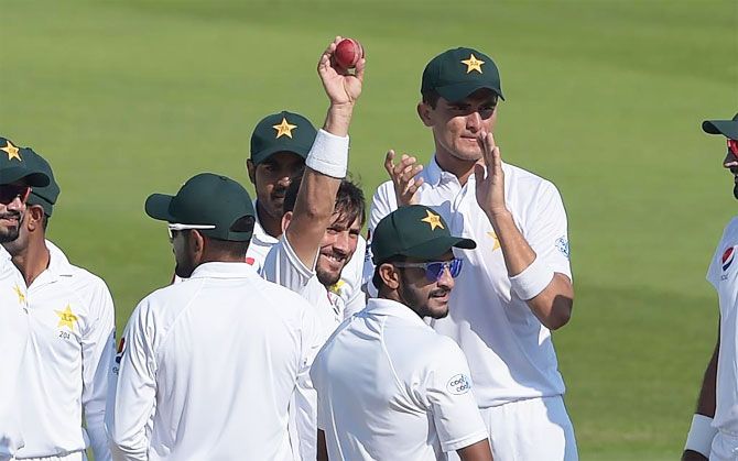Yasir Shah celebrates after picking his 200th Test wicket during the 3rd Test against New Zealand on Thursday