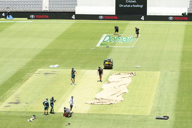 Australia's Josh Hazlewood inspects the pitch during an Australian training session at Optus Stadium in Perth on Thursday
