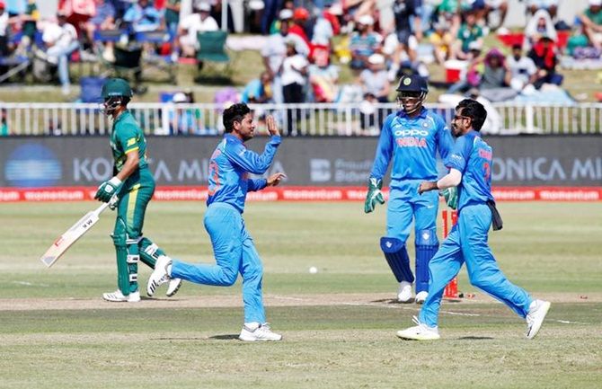 Kuldeep Yadav and Yuzvendra Chahal celebrate J P Duminy's wicket in the first ODI against South Africa, Durban, February 1, 2018. Photograph: Rogan Ward/Reuters
