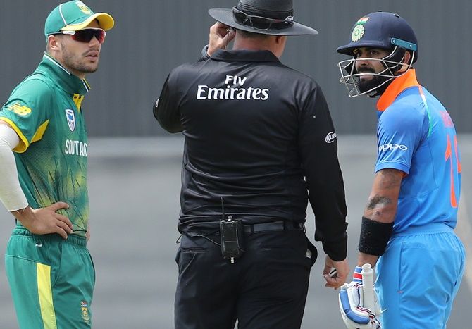 South Africa's stand-in captain Aiden Markram (left) impressed Virat Kohli (right) with his calmness when things were not going his way