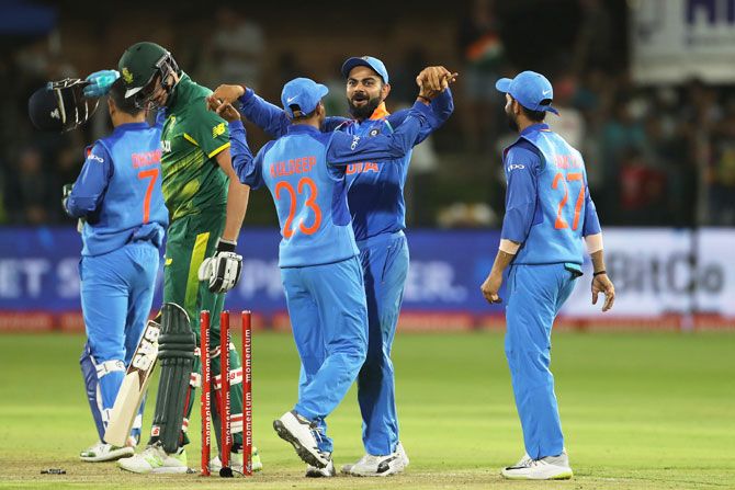 India captain Virat Kohli and his teammates celebrate victory over South Africa in the 5th ODI at Port Elizabeth on Tuesday
