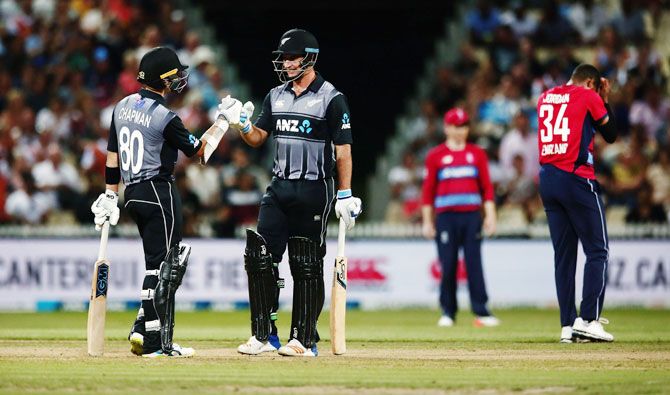 New Zealand'S Mark Chapman and Colin de Grandhomme during the International Twenty20 match against England at Seddon Park in Hamilton on Sunday