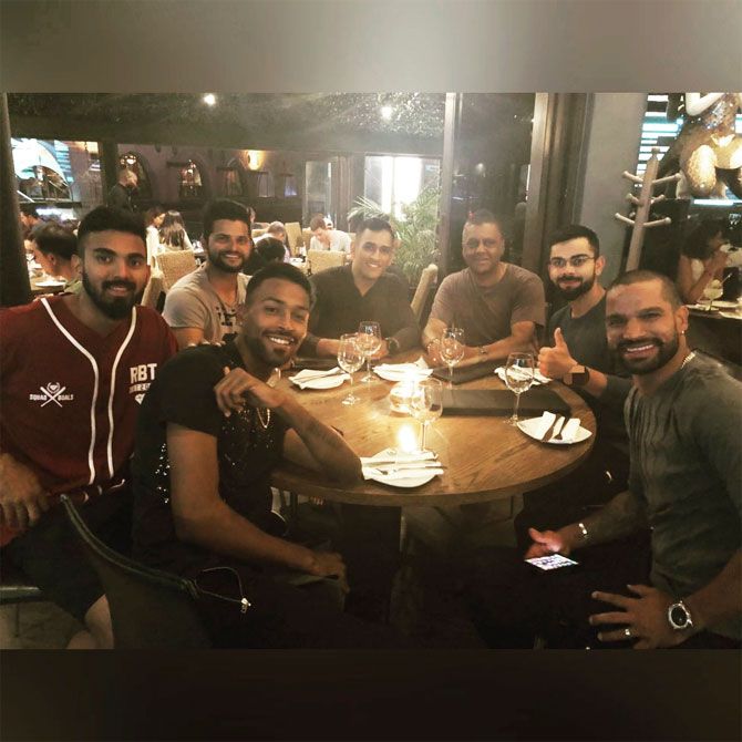 Virat Kohli with teammates at a restaurant on Sunday