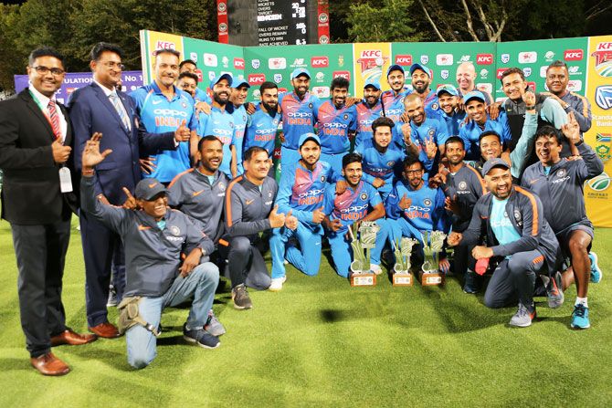 The Indian cricket team poses with the T20I Trophy after defeating South Africa in the 3rd T20I on Saturday