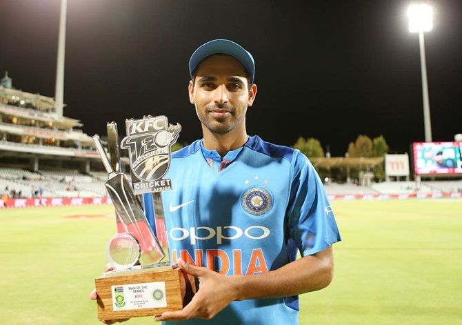  India pacer Bhuvneshwar Kumar shows off his 'Man of the Series' award after Saturday's third T20 International at Newlands, Cape Town