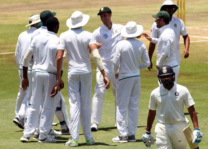 The South Africans celebrate Rohit Sharma's wicket in the second Test. Photograph: BCCI