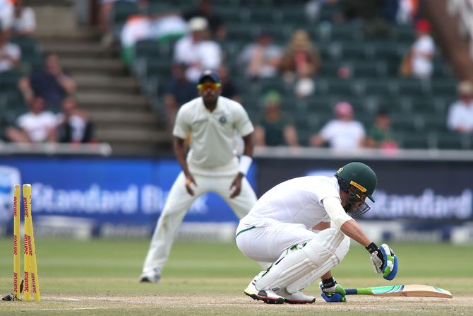 Faf du Plessis is beaten by the bounce, or the lack of it, as he is bowled by Ishant Sharma
